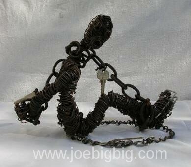 Prisonnier - sculpture de Joe Big-Big Sculteur pour la Paix.